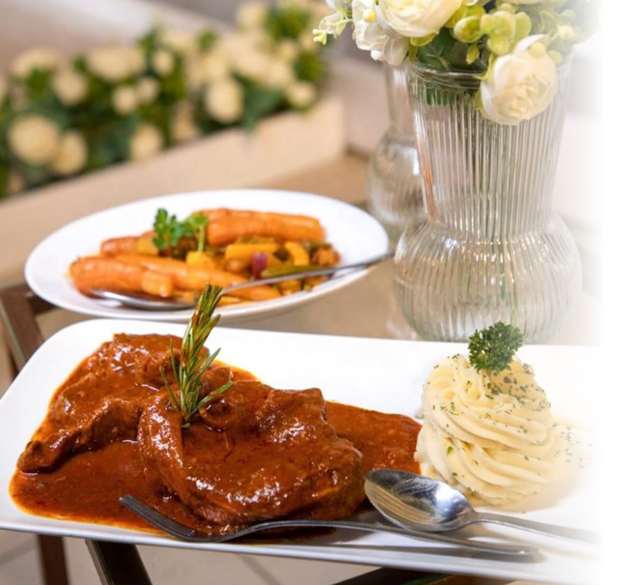 Chef Solly Manjra plating food
